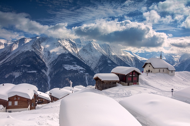 Snowy alpine huts Switzerland
